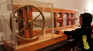 Image: Reciprocating Motor - Many early electric motors were reciprocating motors like this one that moves the wheel when the coils are turned turn on and off at just the right time.