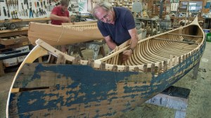 Schuyler Thomson (foreground) of Norfolk Boatworks will be open on Station Place, Norfolk, Conn., to show visitors how a wooden canoe is constructed. He will also be working on building and restoring other boats during Weekend in Norfolk, August 5, 6 and 7. Photo © Bruce Frisch.